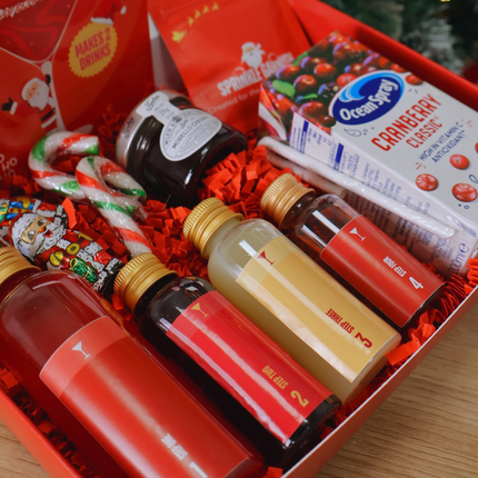 Dear Santa Cocktail Making Kit, filled with pre-measured alcohol, mixers and candy.